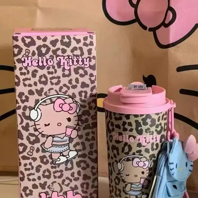 Hello Kitty tumbler and packaging with leopard print design on a beige background