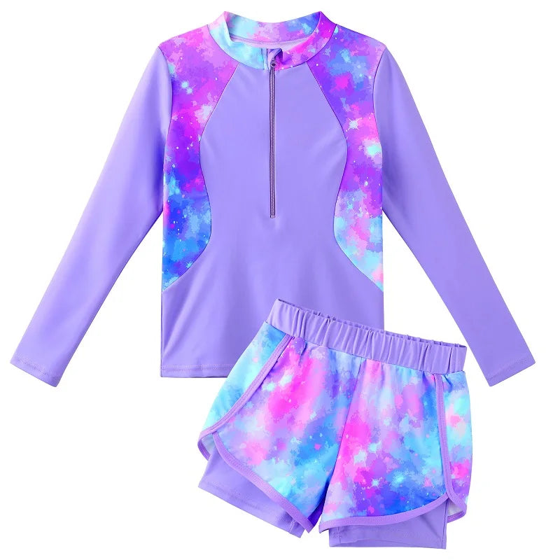 Purple two-piece swimsuit with galaxy pattern on a white background