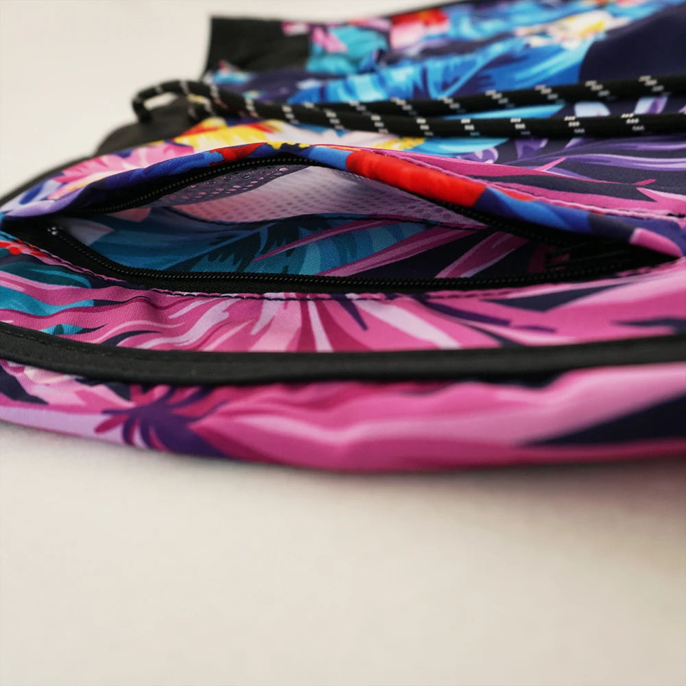 Colorful bag with a tropical pattern on a light background