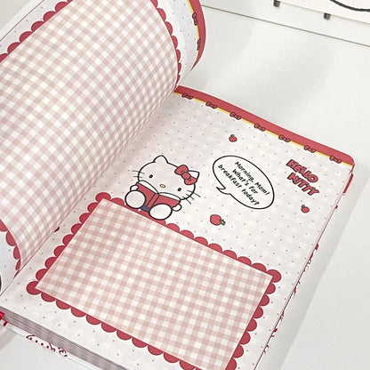 Open book with Hello Kitty design on a white background