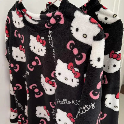 Black fleece fabric with Hello Kitty pattern on a white background