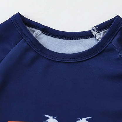 Close-up of a navy blue shirt with a collar detail on a white background