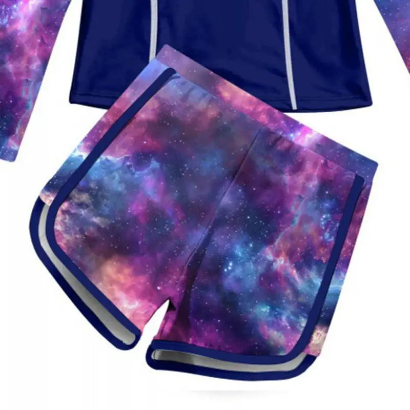 Navy blue hoodie and shorts with galaxy pattern on a white background