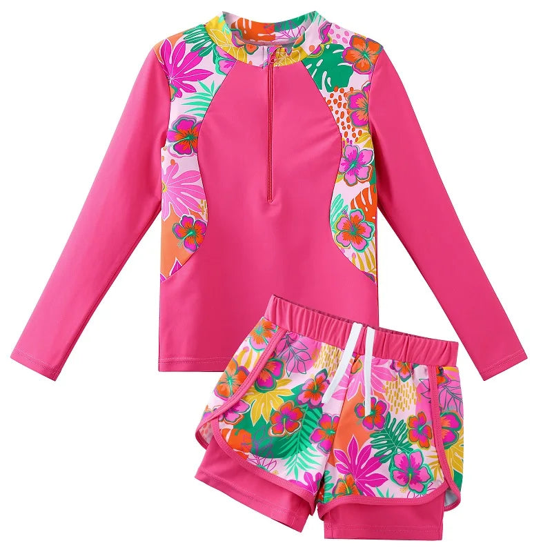 Colorful children's swimsuit set with floral patterns on a white background