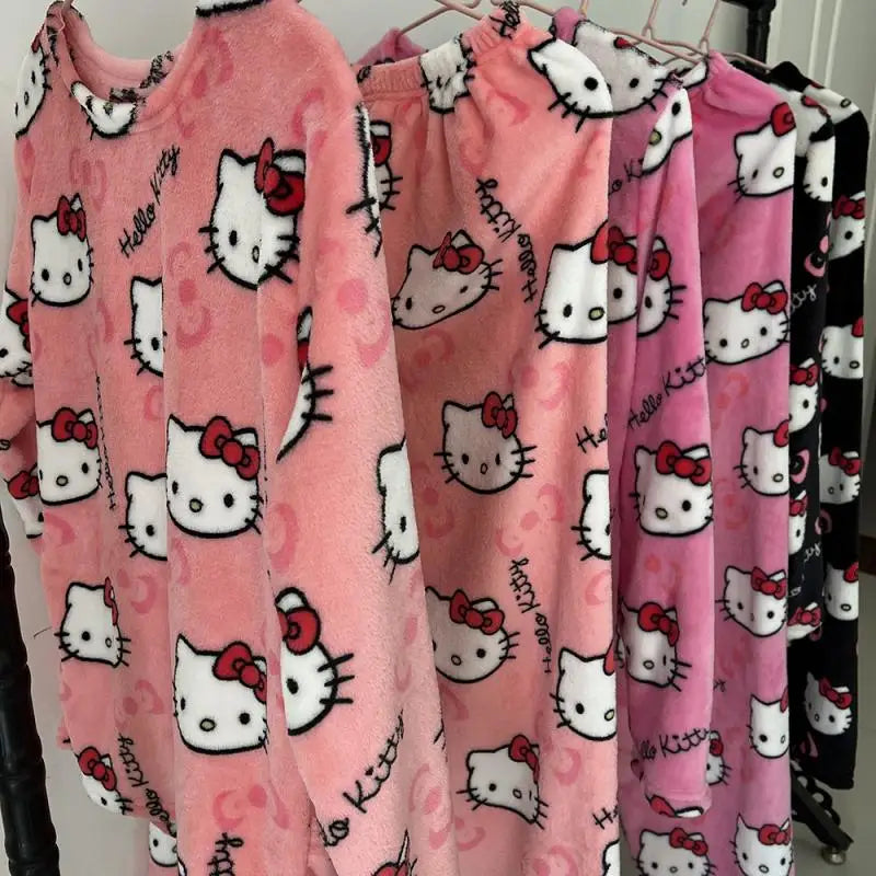 Hello Kitty pajama set with pink and black patterns on a rack.