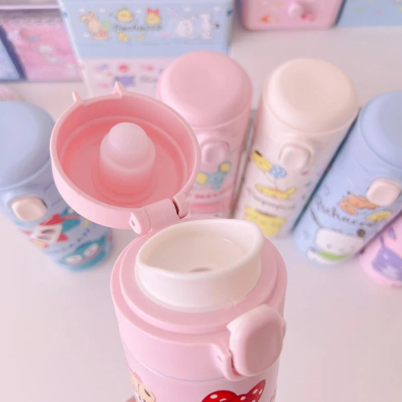 Set of colorful children's thermos bottles with cartoon designs on a white background