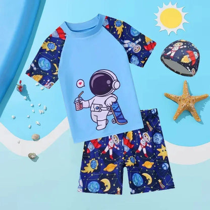 Children's swimsuit set with astronaut design on a blue background