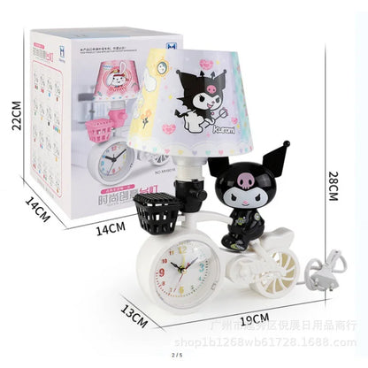 Small bicycle-shaped clock with cartoon character design on a white background