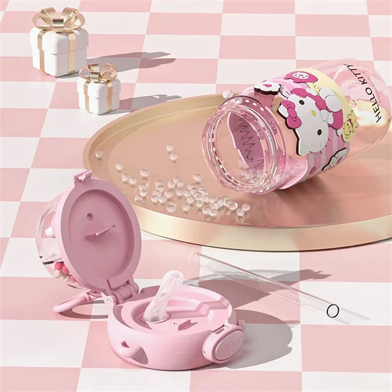 Pink baby bottle with a cartoon character on a pink and white checkered background