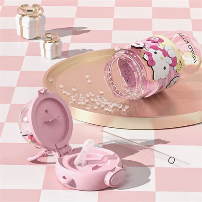 Pink baby bottle with a cartoon character on a pink and white checkered background