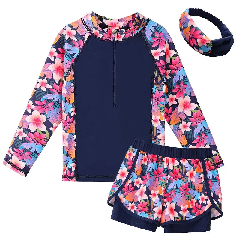 Floral patterned two-piece swimsuit with matching headband on a white background