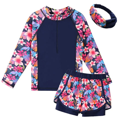 Floral patterned two-piece swimsuit with matching headband on a white background