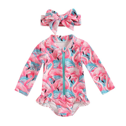 Flamingo-patterned swimsuit with a matching headband on a white background