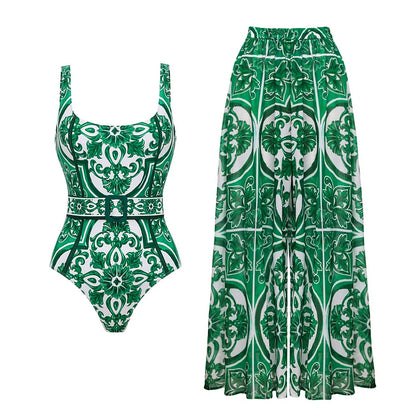 Green and white patterned swimsuit with matching pants on a white background