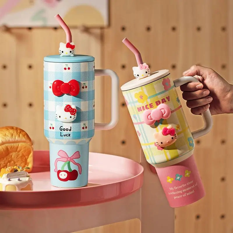 Two colorful tumblers with cartoon character designs on a wooden surface.