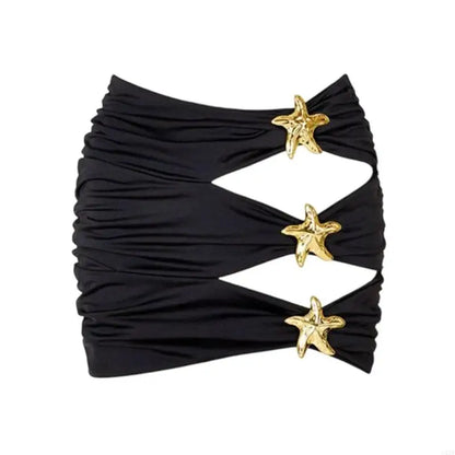 Black bandeau top with gold starfish embellishments on a white background