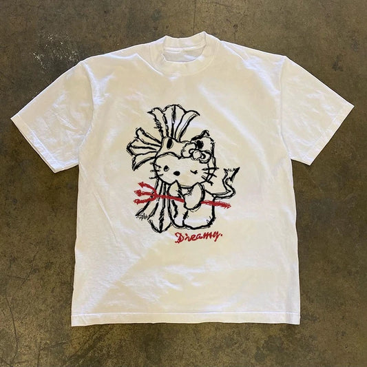 White t-shirt with a graphic design on a textured brown surface
