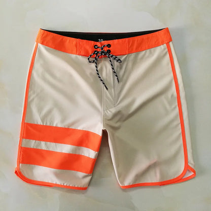 Beige shorts with orange accents on a white background