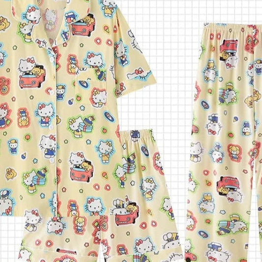 Hello Kitty pajama set on a checkered background with 'PAJAMAS' branding.