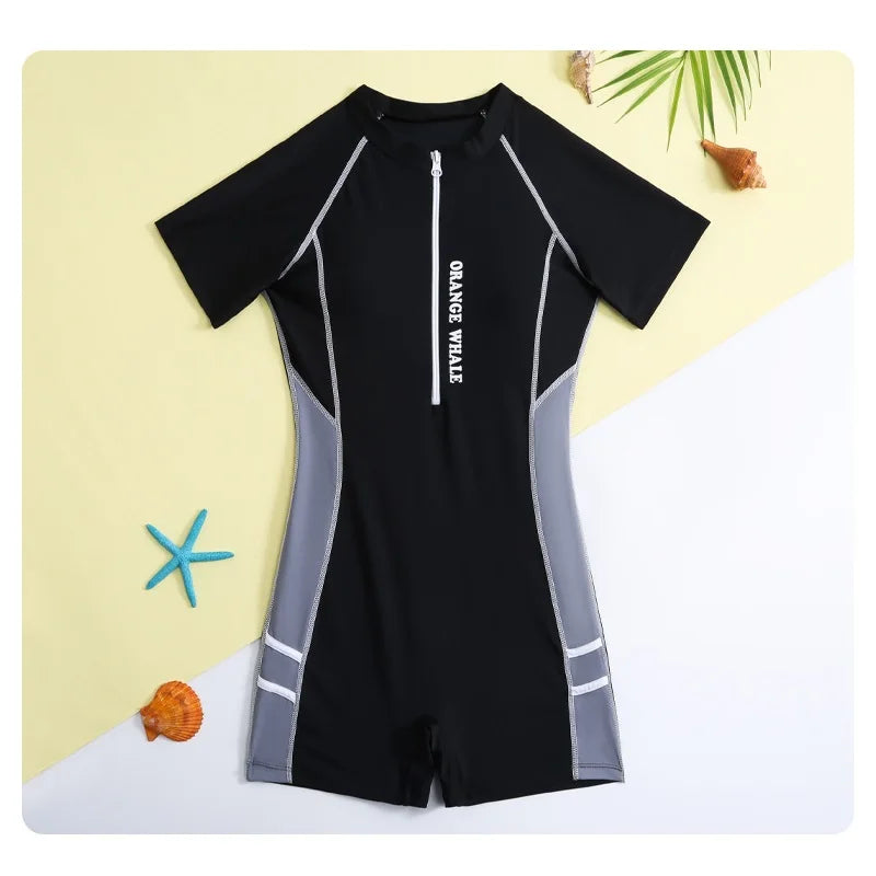 Black swimsuit with gray accents on a yellow and white background