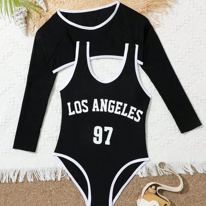 Black swimsuit with 'Los Angeles 97' text on a textured surface