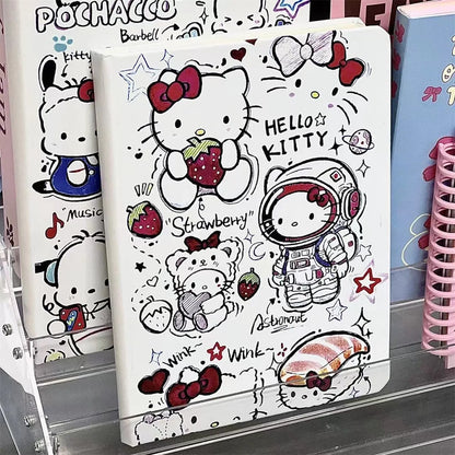 Notebook with Hello Kitty design featuring an astronaut, strawberries, and other elements.