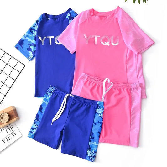 Blue and pink children's swimwear set with 'YTQU' branding on a white background.