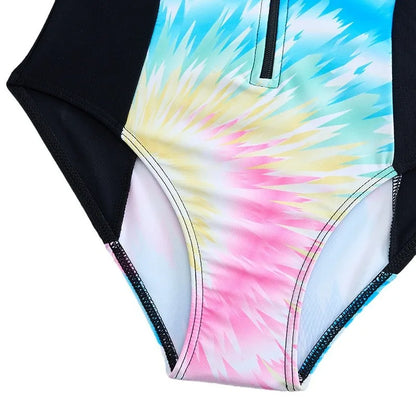 Multicolored tie-dye swimsuit on a marble surface
