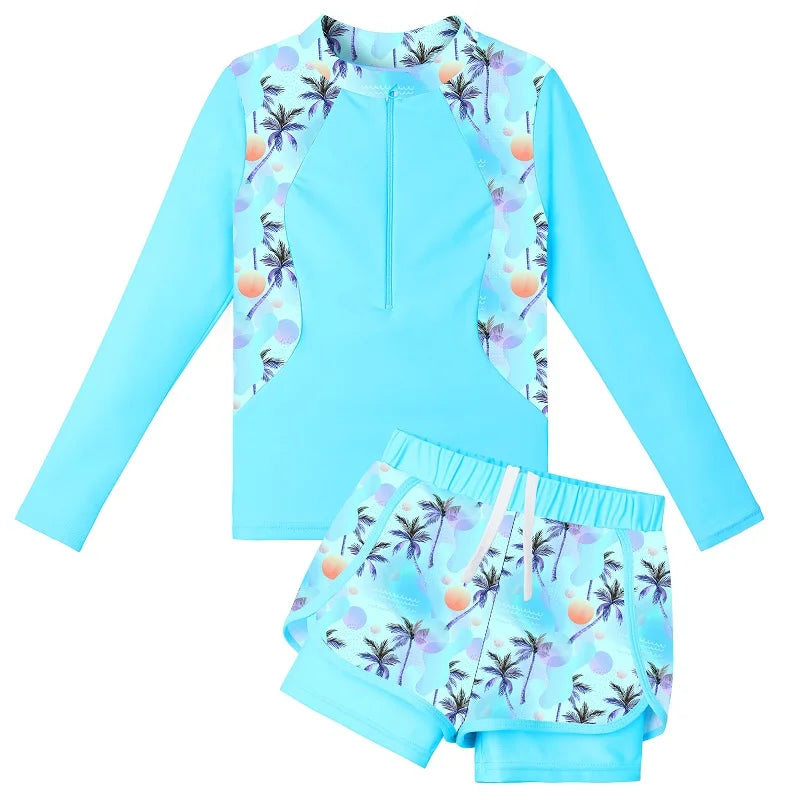 Two-piece swimsuit with long-sleeve top and shorts on a white background