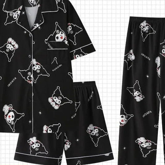 Black pajama set with cartoon dog pattern on a grid background
