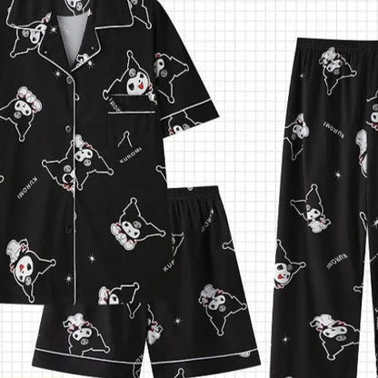 Black pajama set with cartoon dog pattern on a grid background