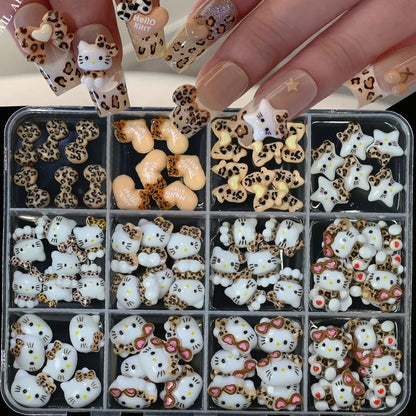Set of decorative resin charms including Hello Kitty and animal designs in a clear plastic case.