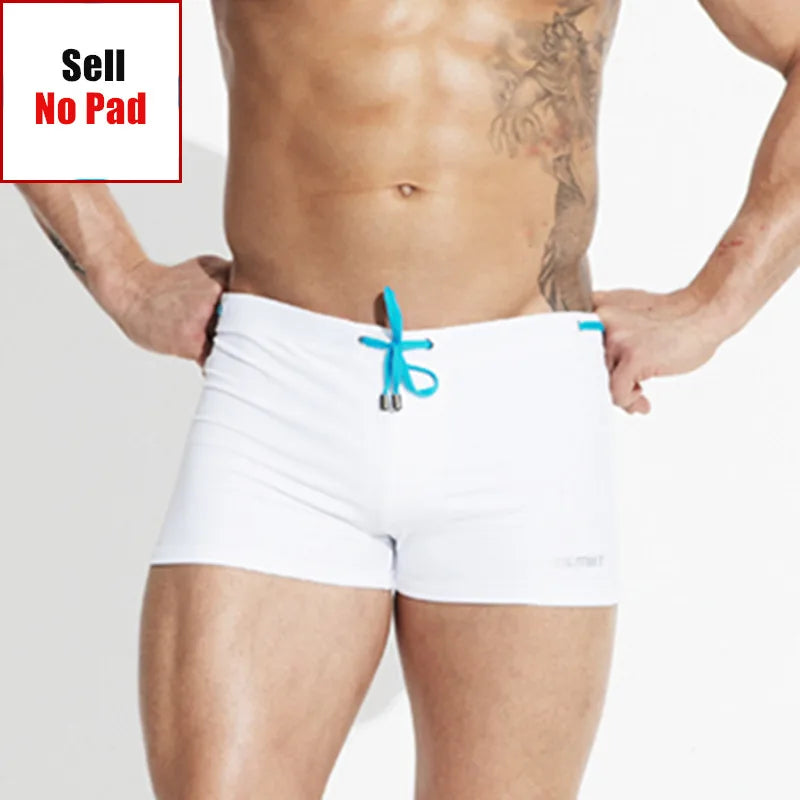 White men's underwear with blue drawstring on a plain background