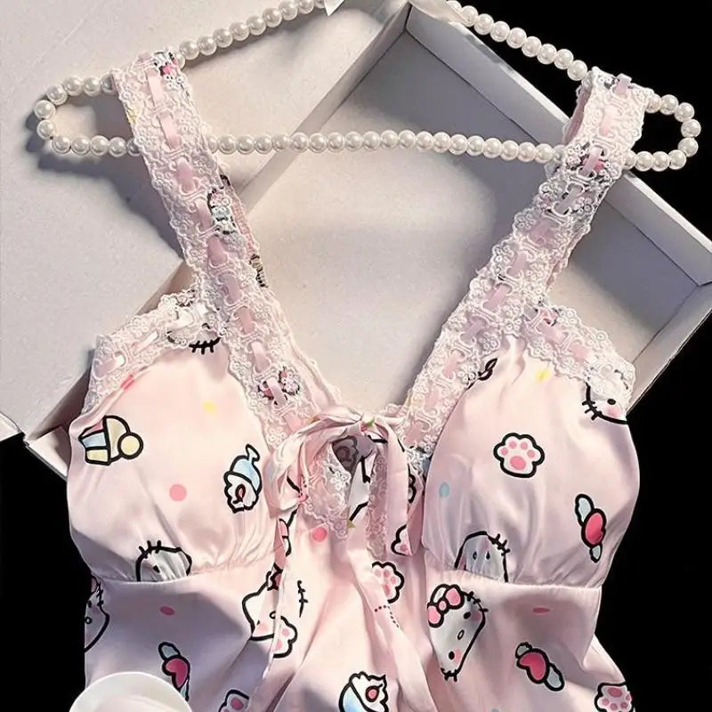 Pink satin bra with cartoon designs on a white background
