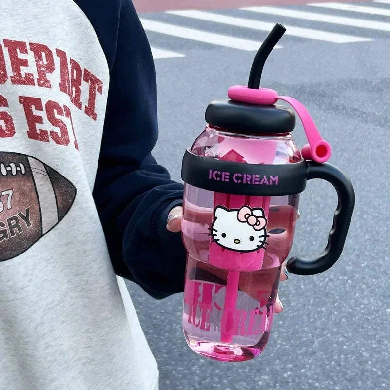 Person holding a pink 'Ice Cream' themed water bottle with a cartoon character design.