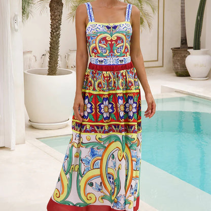 Woman wearing a colorful patterned dress by a pool with palm trees in the background