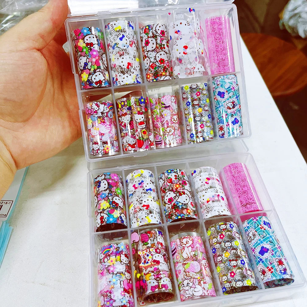 Colorful nail art decorations in a transparent case held by a hand.