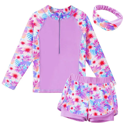 Children's floral swimsuit set with rash guard and shorts on a white background