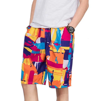 Colorful patterned shorts worn by a person on a white background