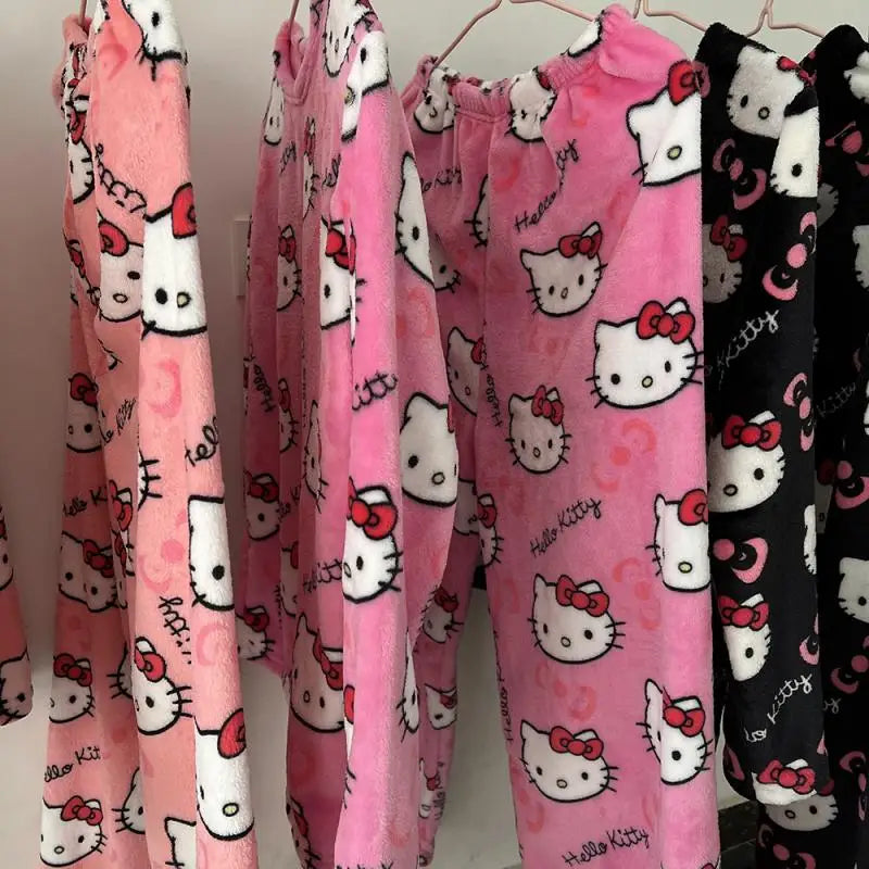 Pink pajama pants with Hello Kitty pattern on a rack.