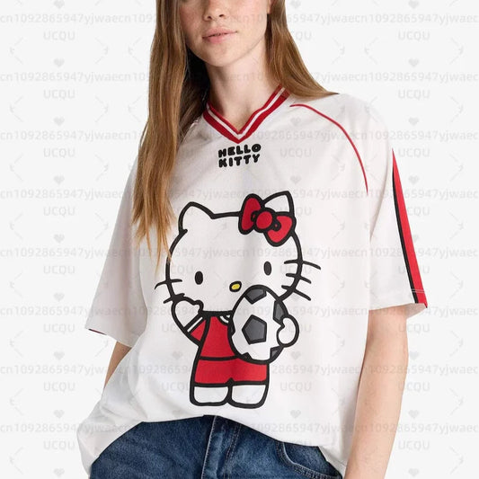 Person wearing a Hello Kitty-themed jersey with a soccer ball design on a white background