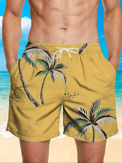Yellow swim shorts with palm tree design on a beach background