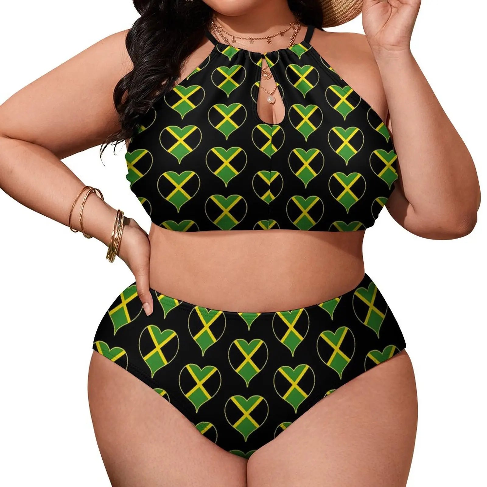 Woman wearing a black bikini with green and yellow heart patterns on a white background