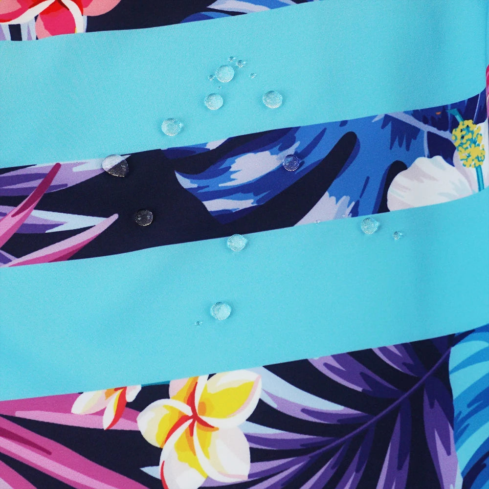 Colorful fabric with floral and abstract patterns on a blue background