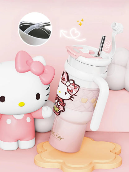 Hello Kitty-themed tumbler with a straw on a pink background