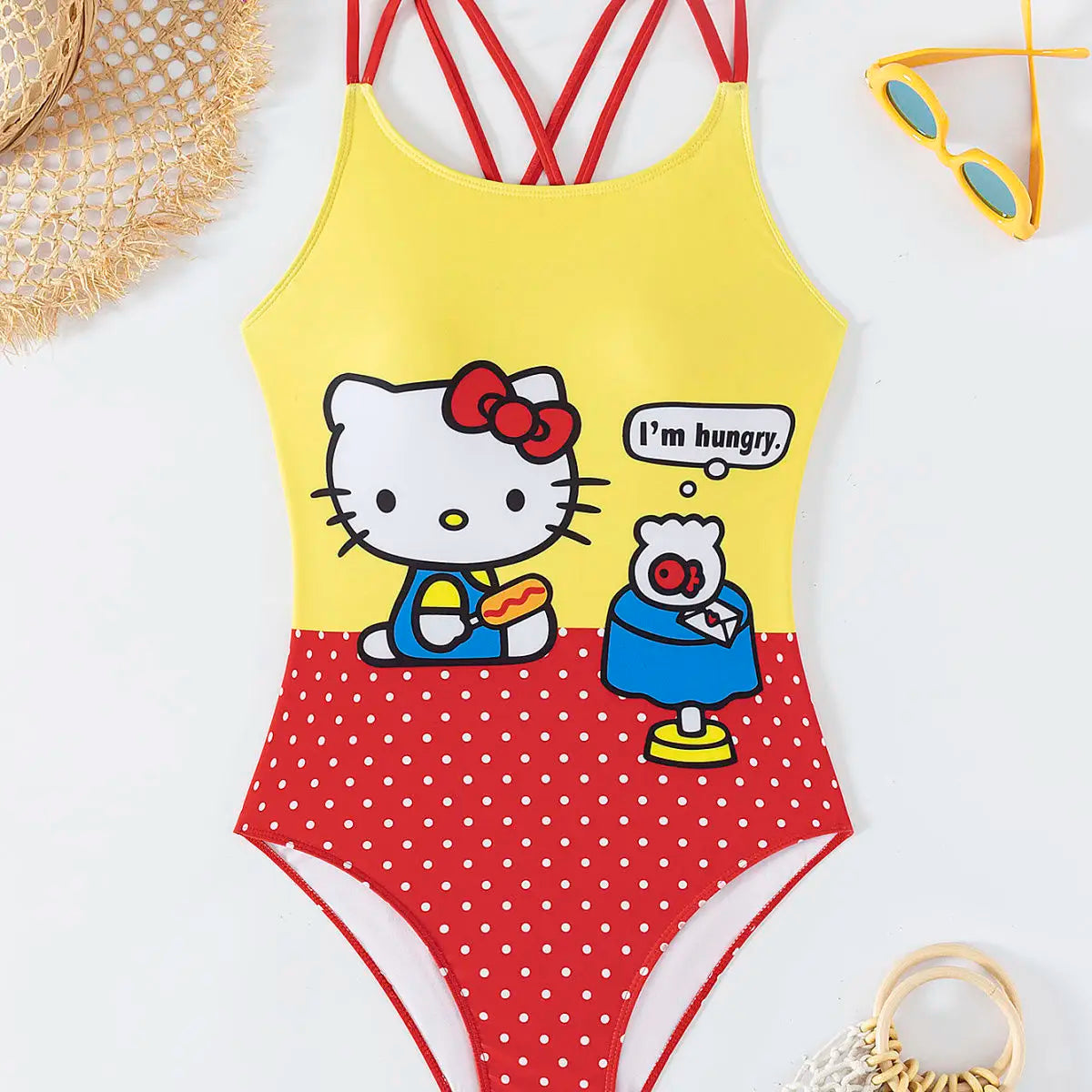 Yellow and red swimsuit with cartoon character on a white background