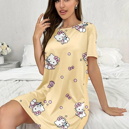 Woman wearing a yellow nightgown with Hello Kitty patterns in a bedroom setting.
