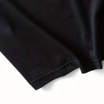 Close-up of a black fabric with a pink 'Somrio' logo in the corner.
