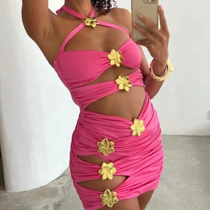 Pink dress with gold floral embellishments worn by a person, taking a mirror selfie.