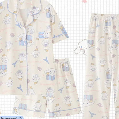 Children's pajama set with cartoon patterns on a checkered background, featuring the brand 'PAJAMSO'.